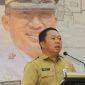 Kepala Bappelitbangda Kota Ternate Rizal Marsaoly saat Membaca Usulan yang Masuk Dalam Musrenbang RKPD. (Humas for Rakyatmu)