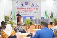 Ketua KONI Kota Ternate M. Gifari Bopeng saat Membacakan Sambutan di Raker ke II, Bertempat di Jati Hotel.