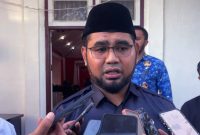 Bupati Halmahera Selatan Bassam Kasuba usai Menyerahkan Santunan Kematian secara Simbolis dari BPJS Ketenagakerjaan kepada Tiga Ahli Waris Sebesar Rp 42 Juta. (Rakyatmu)