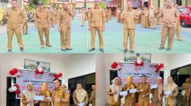 Kepala Dinas Pendidikan Kota Ternate Muchlis Djumadil dan Sekretaris Bersama Pegawai Ikut Lomba serta Penyerahan Hadiah. (Dede/Rakyatmu)