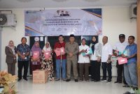 Penerima Bantuan Bersama Wali Kota Ternate M. Tauhid Soleman, Sekretaris Daerah Rizal Marsaoly dan Kepala Disnaker Nuraini Nawawi. (Ongky/Rakyatmu)