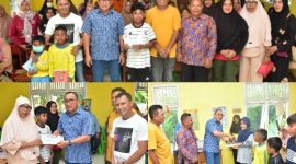 Wali Kota Ternate M. Tauhid Soleman dan Kepala Dinas Pendidikan Muchlis Djumadil Serahkan Bantuan kepada Korban Banjir Bandang. (Dok. Humas for Rakyatmu)