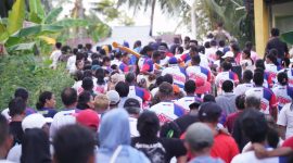 Warga Kecamatan Pulau Batang Dua Jemput Kedatangan Paslon Nomor Urut 2, M. Tauhid Soleman dan Nasri Abubakar. (Istimewa)