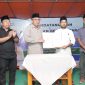 Penyerahan berita acara dan serah terima aset lahan kubur dari pemerintah ke masyarakat kelurahan fitu. (Istimewa)