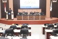 Pjs. Wali Kota Ternate Tahmid Wahab Menyampaikan RAPBD Tahun 2025 dalam Sidang Paripurna di Gedung DPRD. (Istimewa) 