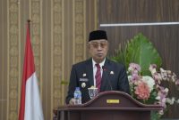 Wali Kota Tidore Kepulauan Capt, H. Ali Ibrahim menyampaikan sambutan di rapat paripurna tentang pengumuman akhir masa jabatan di Aula Gedung DPRD. (Istimewa)  