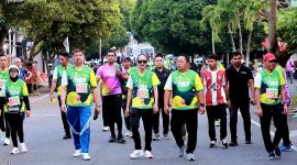 Sekda Kota Ternate Rizal Marsaoly bersama Kepala Kejaksaan Tinggi Maluku Utara Herry Ahmad Pribadi di Acara Adhyaksa Fun Run Malut 2025. (Dok. Humas for Rakyatmu)