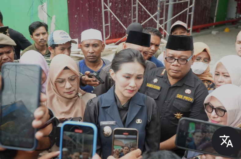 Wakil Ketua DPRD Maluku Utara, Husni Bopeng saat mendampingi Gubernur Sherly Tjoanda. (Dok. Istimewa)
