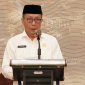 Plt. Kepala Bappelitbangda Kota Ternate, Taufik Jauhar saat Menyampaikan Laporan di Forum Perangkat Daerah dan Musrenbang RKPD.
