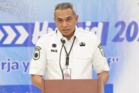 Plt Kepala Disnaker Kota Ternate, Faizal Badaruddin saat Menyampaikan Laporannya di Pembukaan Job Fair