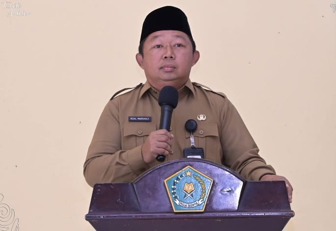 Sekda Kota Ternate, Rizal Marsaoly saat Menyampaikan Sambutan di Pelantikan PD PGM Indonesia Kota Ternate. (Istimewa/RakyatMu)