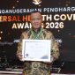 Wali Kota Tidore Kepulauan Muhammad Sinen menerima penghargaan UHC Award Kategori Madya Tahun 2026 dalam acara Deklarasi dan Pencanangan UHC Award. (Istimewa)