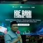 Plt. Kepala Dinas Koperasi dan UKM Kota Ternate, Chairul Saleh Arief  Menghadiri kegiatan Kie Raha Economic Forum. (Dok. RakyatMu/Gemini AI)